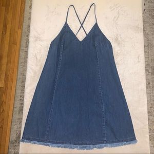 Lush Denim Minidress with Low Strappy Crisscross Back Fringe Hem